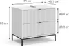 A white vanity cabinet with two drawers and black legs, shown with dimensions indicated by measurement lines and text. Voir les images du produit