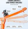 An orange crane with labels indicating load ranges and telescopic lengths. Anteprima dell’immagine prodotto