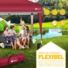 A family enjoying a picnic under a red pop-up gazebo next to a lake. Náhľad obrázku produktu