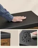 A collage of images showing the texture and water-resistant properties of a black upholstered bench. Náhled obrázku produktu