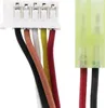 A close-up view of a white connector with multiple colored wires extending from it, and a translucent yellow connector on the right. Voir les images du produit