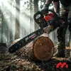A person is using a chainsaw to cut a log in a forest. Produktbild-Vorschau