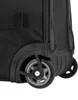 A close-up view of the wheels and bottom corner of a black travel bag. Náhled obrázku produktu