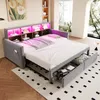 A modern bedroom with a grey sofa bed pulled out, featuring pink LED lighting and storage shelves in the headboard. The bed is made with white linens and a pink throw blanket. Two storage drawers are visible underneath the bed. Náhled obrázku produktu