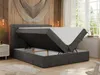 A bedroom scene with a dark gray upholstered bed frame, open to reveal storage space, and a white mattress and topper. Produktbild-Vorschau
