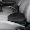 A black seat cushion placed on a car seat. Produktbild-Vorschau