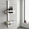 A shower organizer with two shelves mounted on a wall. Anteprima dell’immagine prodotto