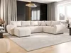 A modern living room with a large U-shaped sofa, curtains, and a decorative light fixture. Náhled obrázku produktu
