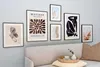 A gallery wall of framed art above a sofa. Produktbild-Vorschau