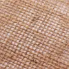 A close-up view of a woven jute fabric. Náhled obrázku produktu