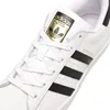 A close-up view of an Adidas Superstar sneaker. Podgląd zdjęcia produktu