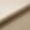 A close-up view of beige velvet fabric, showing the texture and folds. Náhled obrázku produktu