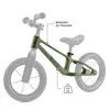 A green balance bike with gray wheels and handlebars, presented on a white background with informational text and icons. Produktbild-Vorschau