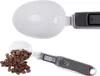 A collage of two images showing a digital spoon scale. The top image shows the scale without any contents, and the bottom image shows the scale with coffee beans and a digital reading of '3.0'. Náhľad obrázku produktu