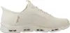 A side view of a beige Skechers slip-on sneaker. Produktbild-Vorschau