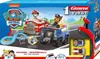 The image shows the packaging of a Carrera First Paw Patrol race track set, featuring toy cars and characters. Voir les images du produit