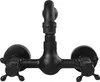 A black wall-mounted faucet with two cross-shaped handles. Produktbild-Vorschau