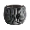 A dark gray, textured planter pot with a wavy, ribbed design. Náhľad obrázku produktu