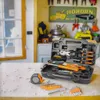 A tool kit laid out on a workbench with various tools and accessories. Produktbild-Vorschau