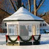A gazebo decorated for Christmas in the snow. Náhled obrázku produktu