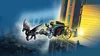 A LEGO Harry Potter set featuring a winged horse pulling a carriage, with two minifigures, set against a backdrop of buildings. Náhled obrázku produktu
