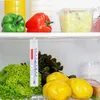 Inside of a refrigerator filled with various fruits and vegetables. Produktbild-Vorschau