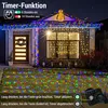 A house decorated with colorful Christmas lights at night, with text overlay describing a timer function. Produktbild-Vorschau