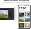 A digital camera is shown next to a smartphone displaying photos, illustrating the connection between the two devices. Podgląd zdjęcia produktu