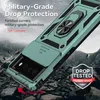 A teal phone case with a ring holder and camera cover is shown on a rocky, uneven surface, with a background of mountains and debris falling. Produktbild-Vorschau