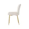 A side view of a single beige upholstered chair with gold metal legs, isolated on a white background. Produktbild-Vorschau