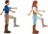 Two toy figures, a boy and a girl, are shown in profile, appearing to walk or march. They are depicted with multiple limb positions to suggest movement. Produktbild-Vorschau