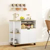 A kitchen cart with storage and a countertop is shown in a room setting. Podgląd zdjęcia produktu