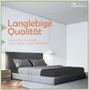 A bedroom scene with a bed and bedding, featuring marketing text. Produktbild-Vorschau
