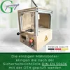 A machine with a lever and buttons, likely for testing or manufacturing, is shown with a green overlay at the bottom and a logo at the top left. Anteprima dell’immagine prodotto