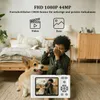 A child is taking a picture of a dog with a vintage-style camera, with a digital camera displaying the same scene in the foreground. Náhľad obrázku produktu