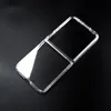 A clear, flip-style phone case is shown against a black background. Náhled obrázku produktu