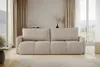 A beige sofa is shown in a well-lit room with large windows and curtains. Podgląd zdjęcia produktu