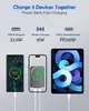 Diagram showing a power bank charging three devices simultaneously via USB-A, wireless charging, and USB-C. Produktbild-Vorschau