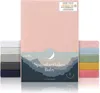 A stack of baby fitted sheets in various colors, with a pink sheet prominently displayed in the center. Produktbild-Vorschau