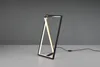 A modern LED table lamp with a geometric design. Náhľad obrázku produktu