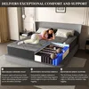 A cutaway view of a mattress with a person lying on it, highlighting its internal structure and features. Voir les images du produit