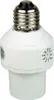 A white lamp adapter with a silver screw base and a dial on the side. Produktbild-Vorschau