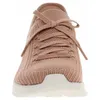 A close-up, front-facing view of a tan sneaker with white accents and laces. Produktbild-Vorschau