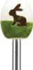 A close-up studio shot of an Easter egg-shaped egg topper with a bunny design, mounted on a silver metal rod. Produktbild-Vorschau