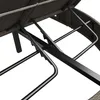 Close-up view of the underside of a lounger, showing its metal frame and wicker material. Podgląd zdjęcia produktu