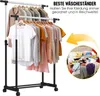 A clothing rack with clothes and a graphic overlay pointing to a messy bed. Anteprima dell’immagine prodotto