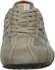 A close-up front view of a beige and gray men's sneaker. Produktbild-Vorschau