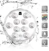 A round LED light submerged in water, surrounded by splashing water. Informational icons and text are on the right side. Produktbild-Vorschau