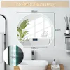 A bathroom scene featuring a round LED mirror above a sink, with dimensions indicated. Produktbild-Vorschau