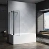 A modern bathroom with a bathtub and a shower screen. Voir les images du produit